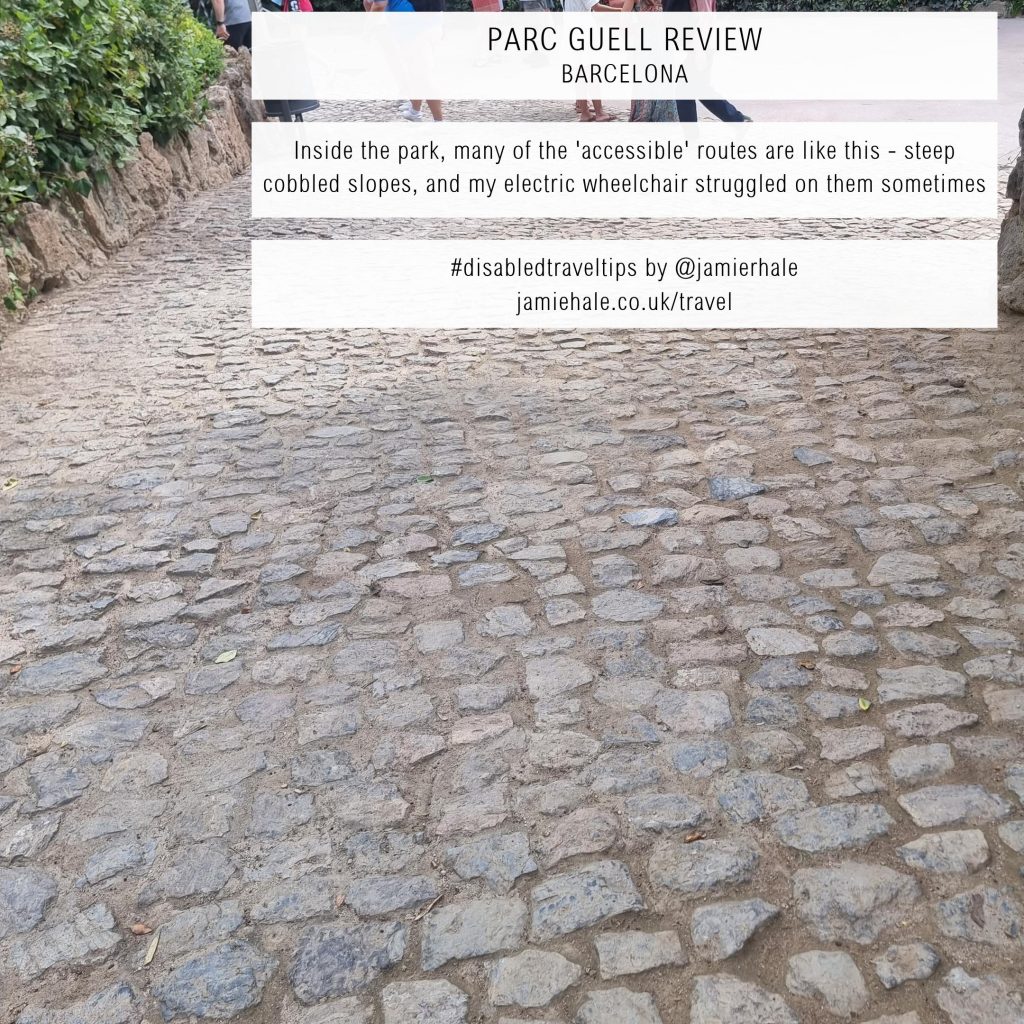 A photo of a cobbled path, with superimposed text reading 'Parc Guell Review - Barcelona', 'Inside the park, many of the 'accessible' routes are like this - steep cobbled slopes, and my electric wheelchair struggled on them sometimes', '#disabledtraveltips by @jamierhale jamiehale.co.uk/travel'