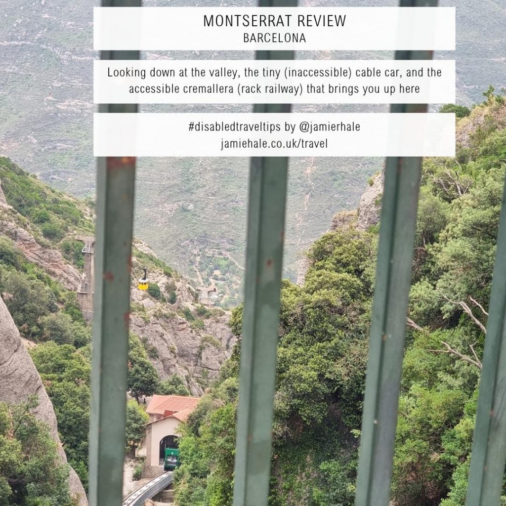 A picture taken from great height up a hillside through some railings showing a valley covered with trees and patches of sandy-coloured rocks. There is a tiny yellow cable car making its way through the air. Superimposed over the top of the image are the words 'Monserrat Review Barcelona', 'Looking down at the valley, the tiny (inaccessible) cable car, and the accessible cremallera (rack railway) that brings you up here', '#disabledtraveltips by @jamierhale