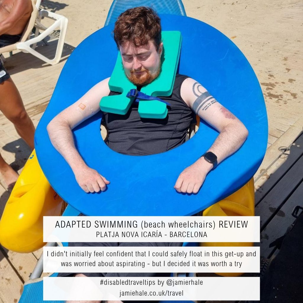 A photo of Jamie Hale sitting in a beach wheelchair with a large blue flotation aid around their torso and a smaller float around their neck. Text superimposed over the top reads 'Adapted Swimming (beach wheelchairs) Review - Platja Nova Icaria - Barcelona', 'I didn't initially feel confident that I could safely float in this get-up and was worried about aspirating - but I decided it was worth a try', '#disabledtraveltips by @jamierhale jamiehale.co.uk/travel'