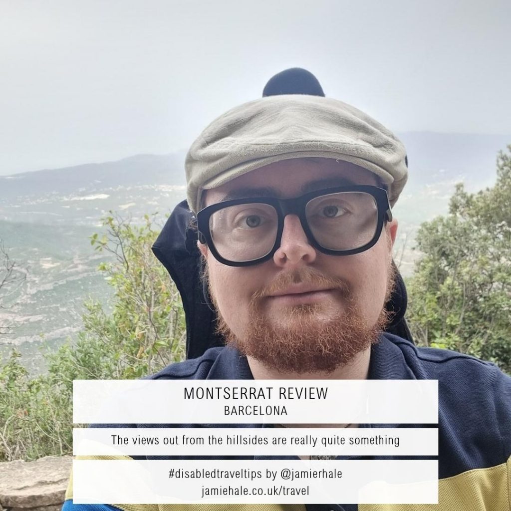 A selfie of Jamie Hale in front of a beautiful view of the Spanish landscape, with text superimposed over the top reading 'Montserrat Review Barcelona', 'The views out from the hillsides are really quite something', '#disabledtraveltips by @jamierhale jamiehale.co.uk/travel'.