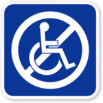 A blue sign showing a wheelchair user with a white line crossing them, as if to say "no disabled"
